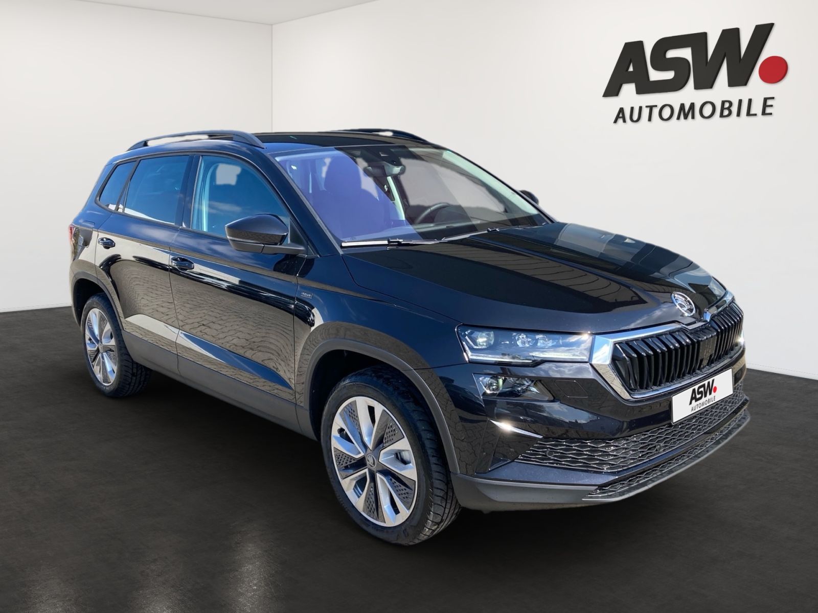 Fahrzeugabbildung SKODA Karoq Tour 1,5TSI 150PS PDC Kamera Navi ACC AHK